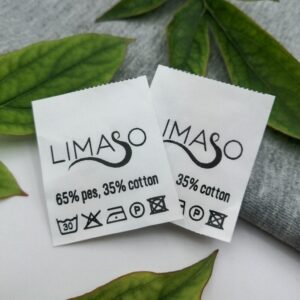 Дві білі етикетки LIMASO зі складом, символами догляду.