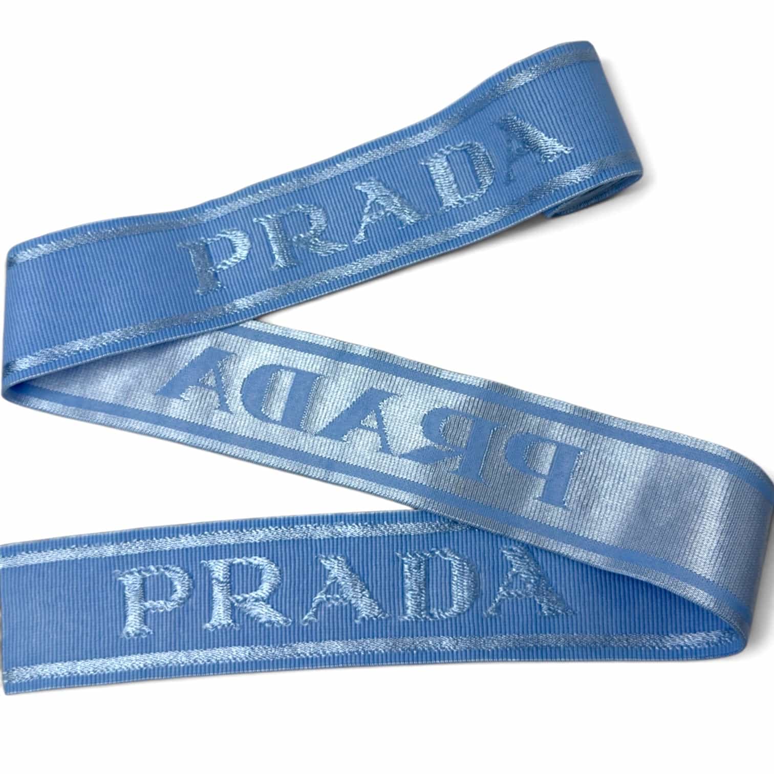 Light blue jacquard elastic band with logo and silver lurex piping