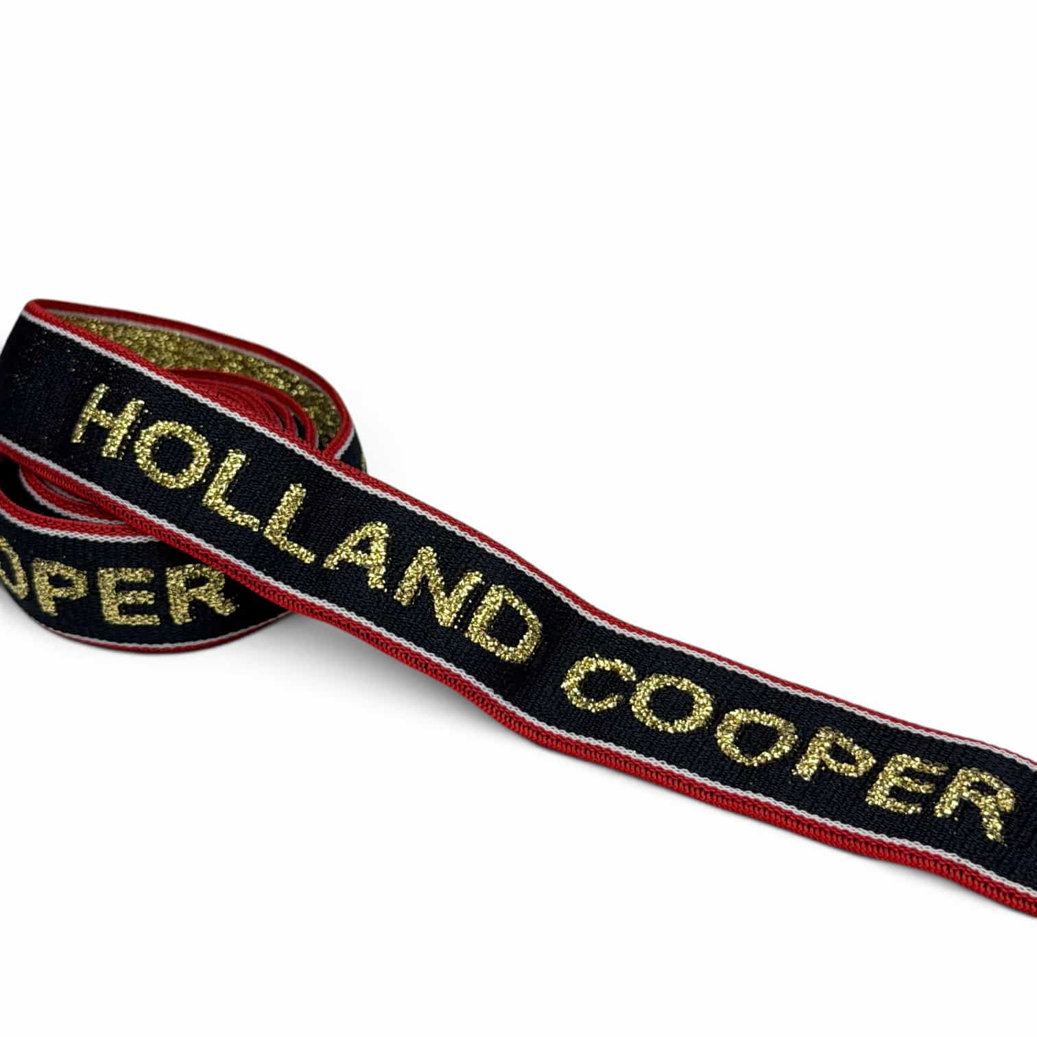 Black jacquard elastic band with gold lurex logo and red piping